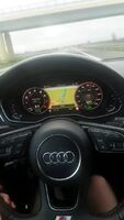 Driving her Audi